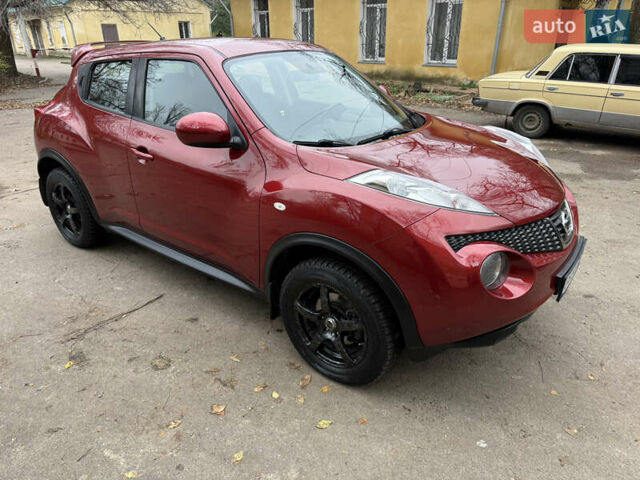 Красный Ниссан Жук, объемом двигателя 1.6 л и пробегом 130 тыс. км за 10500 $, фото 8 на Automoto.ua