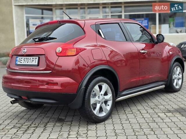 Красный Ниссан Жук, объемом двигателя 1.6 л и пробегом 127 тыс. км за 9777 $, фото 3 на Automoto.ua