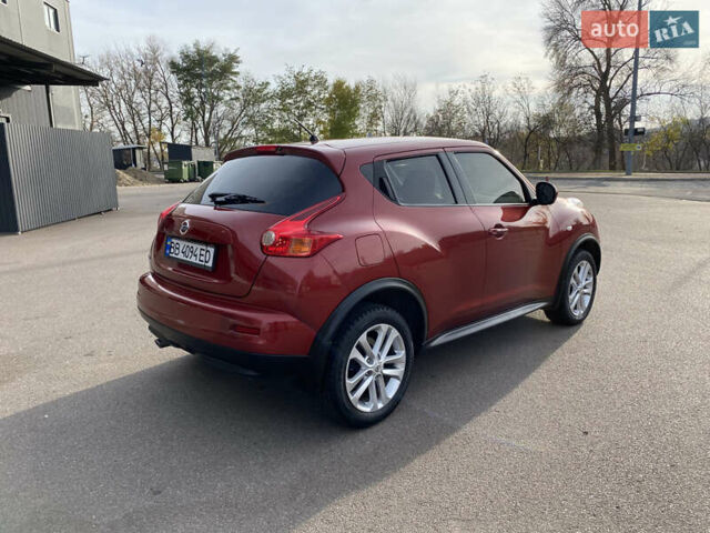 Красный Ниссан Жук, объемом двигателя 1.62 л и пробегом 68 тыс. км за 12200 $, фото 5 на Automoto.ua