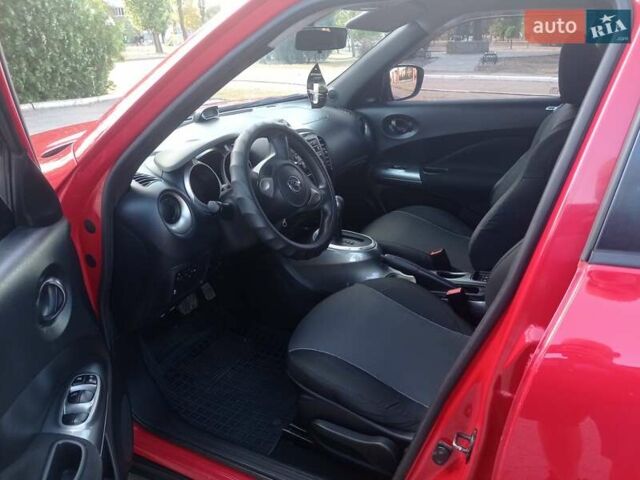 Красный Ниссан Жук, объемом двигателя 1.6 л и пробегом 150 тыс. км за 11200 $, фото 11 на Automoto.ua