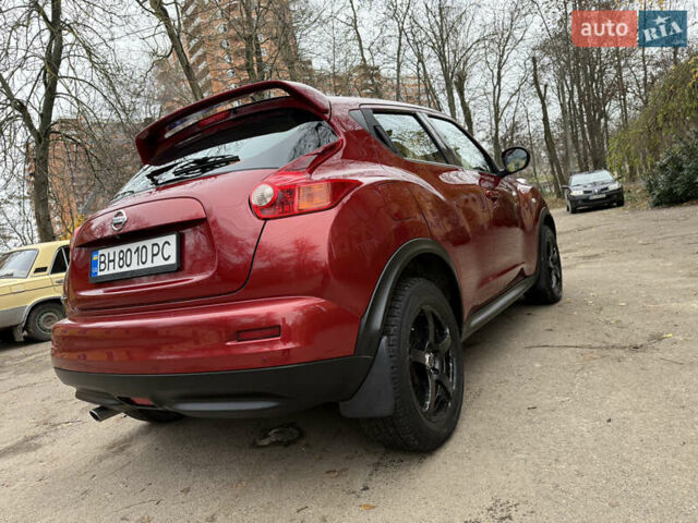 Красный Ниссан Жук, объемом двигателя 1.6 л и пробегом 130 тыс. км за 10500 $, фото 16 на Automoto.ua