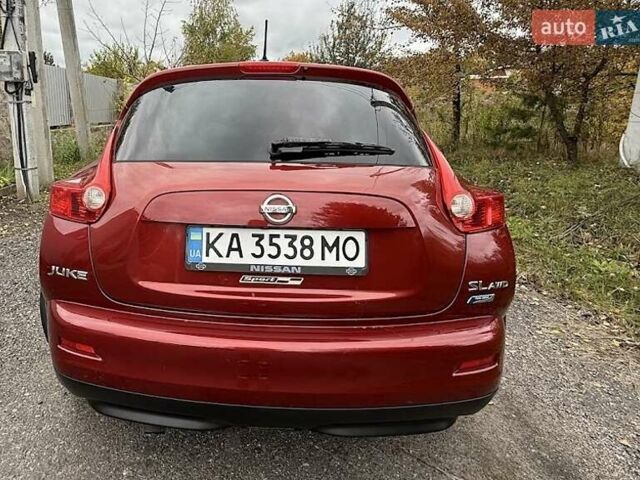 Красный Ниссан Жук, объемом двигателя 1.62 л и пробегом 209 тыс. км за 10500 $, фото 1 на Automoto.ua