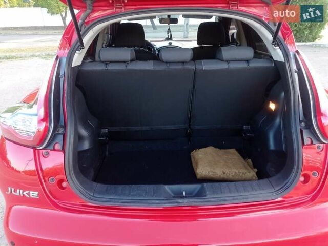 Красный Ниссан Жук, объемом двигателя 1.6 л и пробегом 150 тыс. км за 11200 $, фото 8 на Automoto.ua