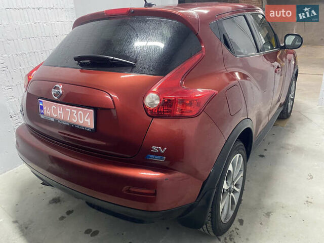 Красный Ниссан Жук, объемом двигателя 1.6 л и пробегом 165 тыс. км за 8200 $, фото 9 на Automoto.ua