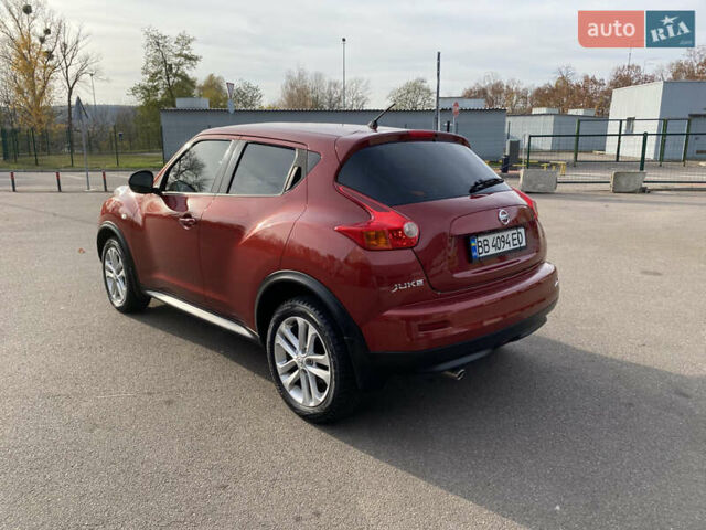 Красный Ниссан Жук, объемом двигателя 1.62 л и пробегом 68 тыс. км за 12200 $, фото 3 на Automoto.ua