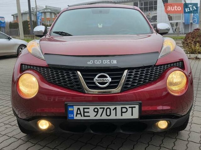 Красный Ниссан Жук, объемом двигателя 1.6 л и пробегом 127 тыс. км за 9777 $, фото 5 на Automoto.ua