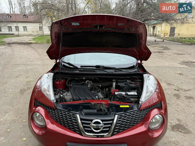 Красный Ниссан Жук, объемом двигателя 1.6 л и пробегом 130 тыс. км за 10500 $, фото 29 на Automoto.ua