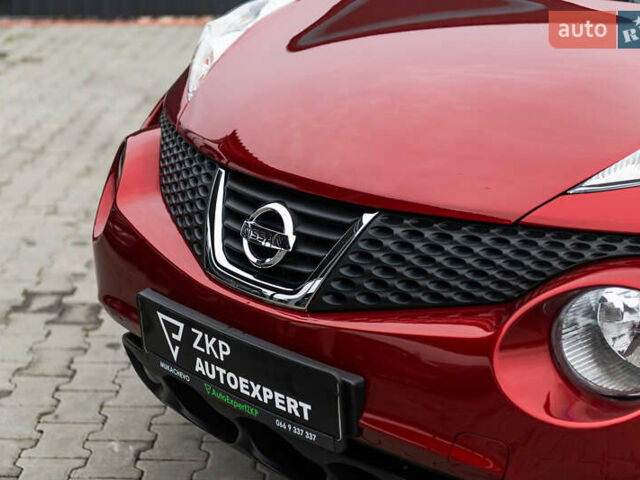 Красный Ниссан Жук, объемом двигателя 1.6 л и пробегом 88 тыс. км за 12400 $, фото 2 на Automoto.ua