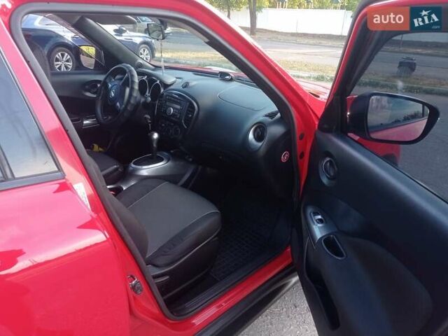 Красный Ниссан Жук, объемом двигателя 1.6 л и пробегом 150 тыс. км за 11200 $, фото 10 на Automoto.ua