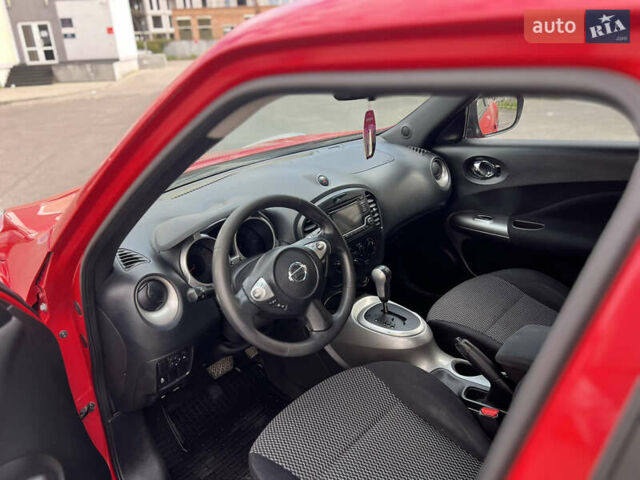 Червоний Ніссан Жук, об'ємом двигуна 1.6 л та пробігом 101 тис. км за 10400 $, фото 9 на Automoto.ua