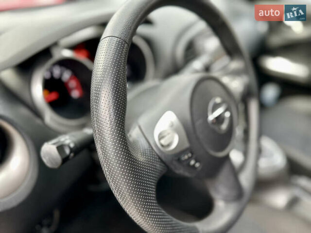 Красный Ниссан Жук, объемом двигателя 1.6 л и пробегом 115 тыс. км за 12000 $, фото 12 на Automoto.ua