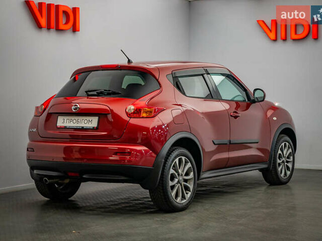 Красный Ниссан Жук, объемом двигателя 1.6 л и пробегом 84 тыс. км за 12272 $, фото 1 на Automoto.ua