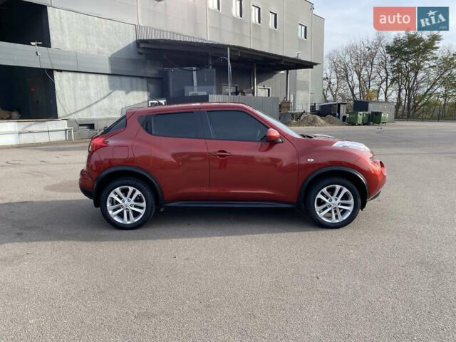 Красный Ниссан Жук, объемом двигателя 1.62 л и пробегом 68 тыс. км за 12200 $, фото 6 на Automoto.ua