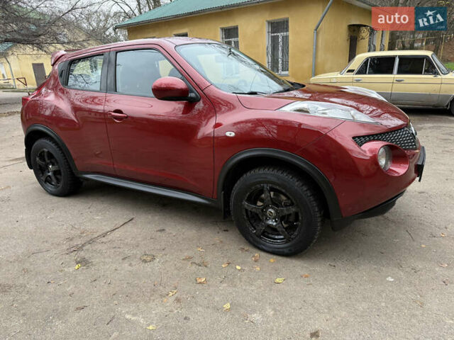 Красный Ниссан Жук, объемом двигателя 1.6 л и пробегом 130 тыс. км за 10500 $, фото 10 на Automoto.ua