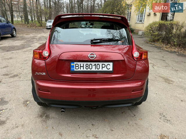 Красный Ниссан Жук, объемом двигателя 1.6 л и пробегом 130 тыс. км за 10500 $, фото 17 на Automoto.ua