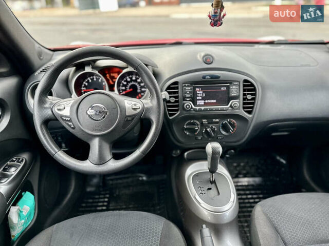 Красный Ниссан Жук, объемом двигателя 1.6 л и пробегом 115 тыс. км за 12000 $, фото 9 на Automoto.ua