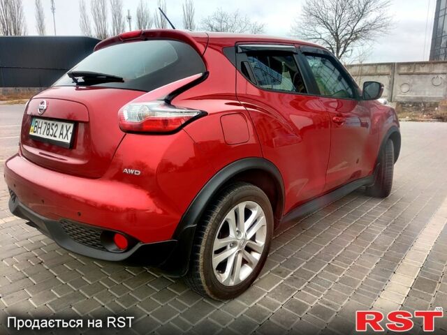 Червоний Ніссан Жук, об'ємом двигуна 1.6 л та пробігом 125 тис. км за 11950 $, фото 6 на Automoto.ua