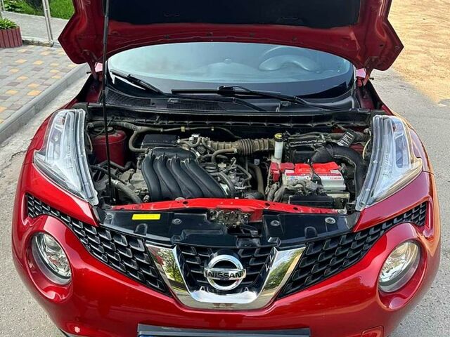 Красный Ниссан Жук, объемом двигателя 1.6 л и пробегом 85 тыс. км за 12500 $, фото 9 на Automoto.ua