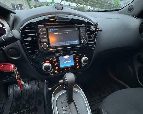 Красный Ниссан Жук, объемом двигателя 1.6 л и пробегом 58 тыс. км за 13000 $, фото 7 на Automoto.ua