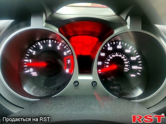 Червоний Ніссан Жук, об'ємом двигуна 1.6 л та пробігом 125 тис. км за 11950 $, фото 9 на Automoto.ua