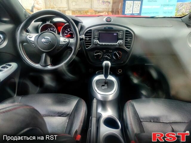 Червоний Ніссан Жук, об'ємом двигуна 1.6 л та пробігом 125 тис. км за 11950 $, фото 10 на Automoto.ua