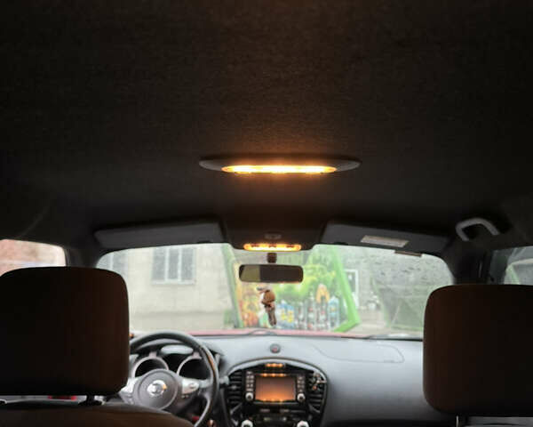 Красный Ниссан Жук, объемом двигателя 1.6 л и пробегом 58 тыс. км за 13000 $, фото 9 на Automoto.ua