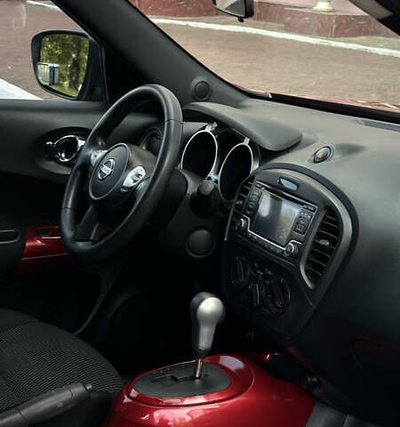 Красный Ниссан Жук, объемом двигателя 1.6 л и пробегом 102 тыс. км за 12300 $, фото 6 на Automoto.ua