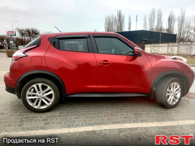 Червоний Ніссан Жук, об'ємом двигуна 1.6 л та пробігом 125 тис. км за 11950 $, фото 5 на Automoto.ua
