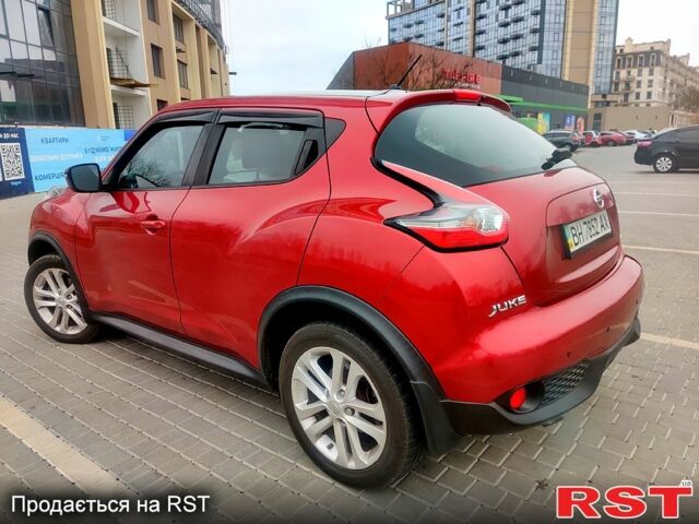 Червоний Ніссан Жук, об'ємом двигуна 1.6 л та пробігом 125 тис. км за 11950 $, фото 2 на Automoto.ua