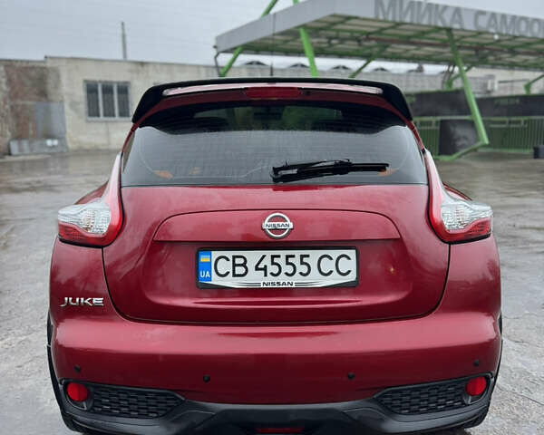 Красный Ниссан Жук, объемом двигателя 1.6 л и пробегом 58 тыс. км за 13000 $, фото 5 на Automoto.ua