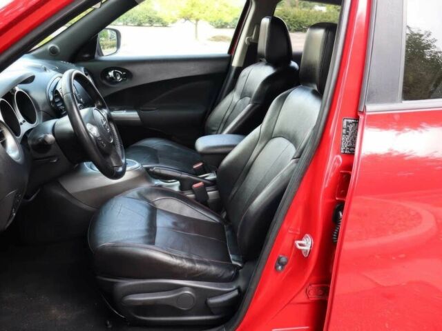 Красный Ниссан Жук, объемом двигателя 1.6 л и пробегом 72 тыс. км за 3500 $, фото 10 на Automoto.ua