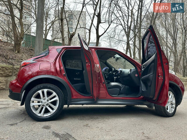 Червоний Ніссан Жук, об'ємом двигуна 1.6 л та пробігом 97 тис. км за 12000 $, фото 7 на Automoto.ua