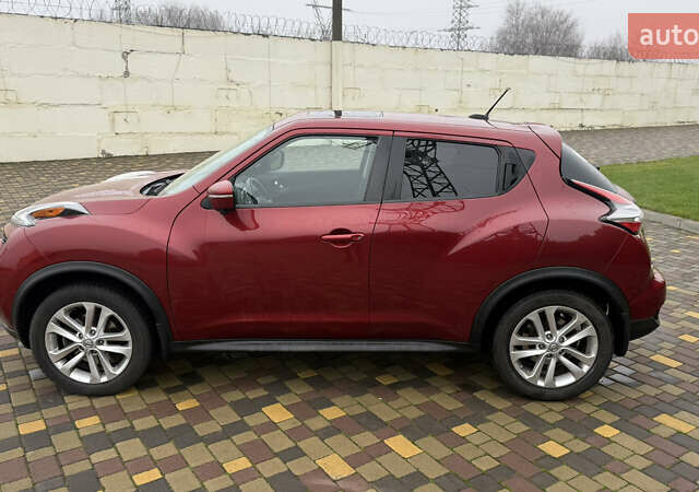 Красный Ниссан Жук, объемом двигателя 1.62 л и пробегом 80 тыс. км за 12680 $, фото 4 на Automoto.ua