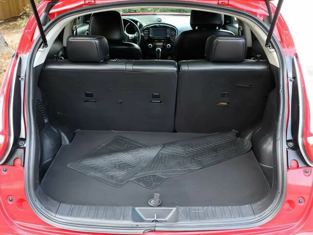 Красный Ниссан Жук, объемом двигателя 1.6 л и пробегом 78 тыс. км за 6000 $, фото 13 на Automoto.ua