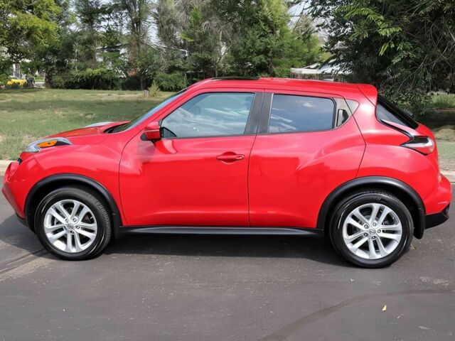 Красный Ниссан Жук, объемом двигателя 1.6 л и пробегом 78 тыс. км за 6000 $, фото 3 на Automoto.ua