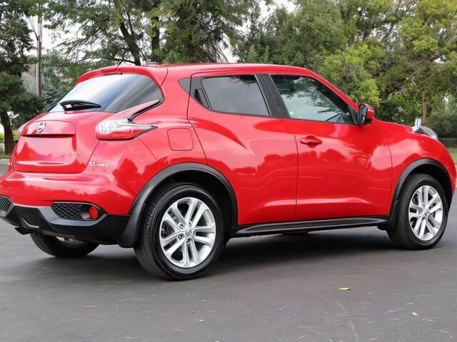 Красный Ниссан Жук, объемом двигателя 1.6 л и пробегом 78 тыс. км за 6000 $, фото 4 на Automoto.ua