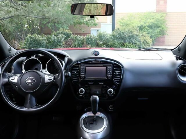 Красный Ниссан Жук, объемом двигателя 1.6 л и пробегом 78 тыс. км за 6000 $, фото 9 на Automoto.ua