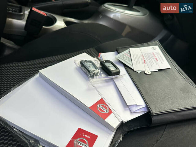 Червоний Ніссан Жук, об'ємом двигуна 1.6 л та пробігом 97 тис. км за 12000 $, фото 11 на Automoto.ua