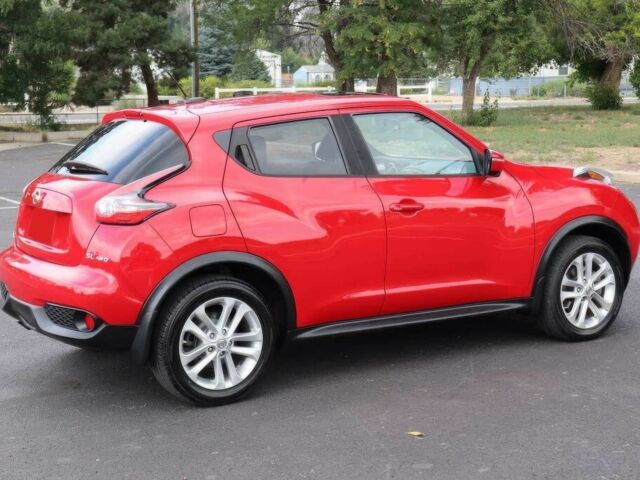 Красный Ниссан Жук, объемом двигателя 1.6 л и пробегом 72 тыс. км за 3500 $, фото 5 на Automoto.ua