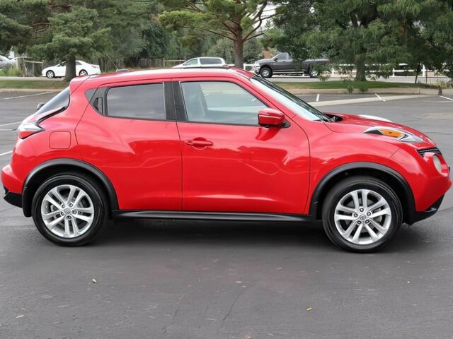 Красный Ниссан Жук, объемом двигателя 1.6 л и пробегом 78 тыс. км за 6000 $, фото 7 на Automoto.ua