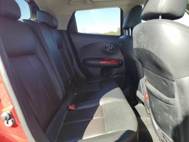 Червоний Ніссан Жук, об'ємом двигуна 1.6 л та пробігом 104 тис. км за 1000 $, фото 10 на Automoto.ua