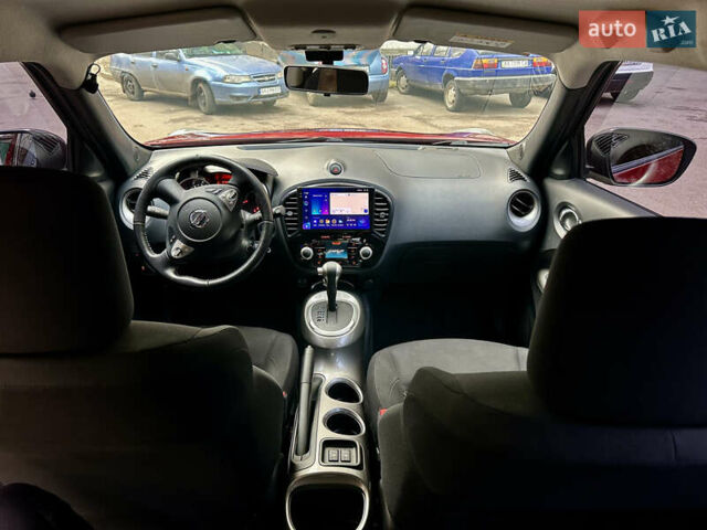 Червоний Ніссан Жук, об'ємом двигуна 1.6 л та пробігом 97 тис. км за 12000 $, фото 8 на Automoto.ua