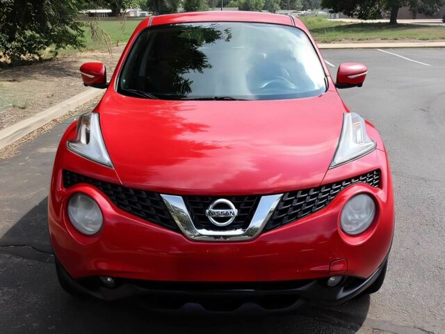 Красный Ниссан Жук, объемом двигателя 1.6 л и пробегом 78 тыс. км за 6000 $, фото 1 на Automoto.ua