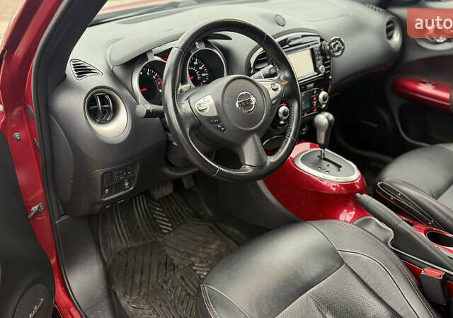 Красный Ниссан Жук, объемом двигателя 1.62 л и пробегом 80 тыс. км за 12680 $, фото 11 на Automoto.ua