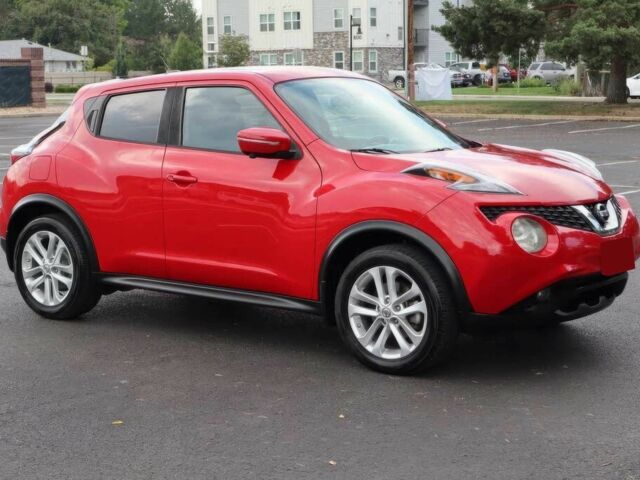 Красный Ниссан Жук, объемом двигателя 1.6 л и пробегом 72 тыс. км за 3500 $, фото 2 на Automoto.ua