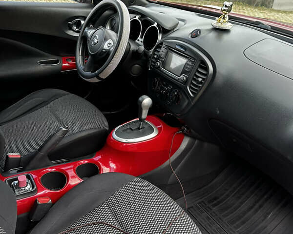 Красный Ниссан Жук, объемом двигателя 1.6 л и пробегом 163 тыс. км за 11500 $, фото 26 на Automoto.ua