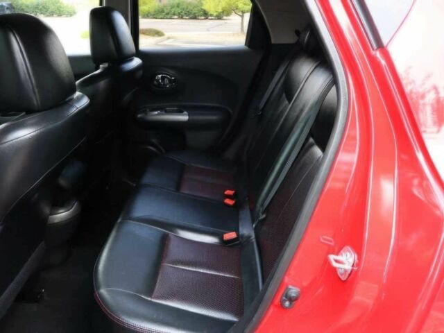 Красный Ниссан Жук, объемом двигателя 1.6 л и пробегом 72 тыс. км за 8000 $, фото 11 на Automoto.ua