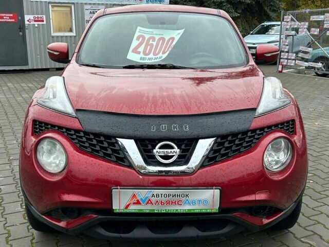 Красный Ниссан Жук, объемом двигателя 1.6 л и пробегом 118 тыс. км за 11900 $, фото 1 на Automoto.ua