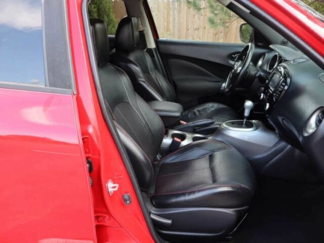 Красный Ниссан Жук, объемом двигателя 1.6 л и пробегом 72 тыс. км за 3500 $, фото 8 на Automoto.ua