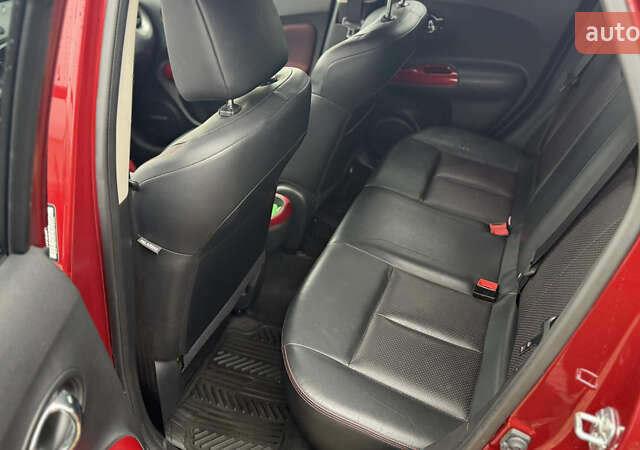 Красный Ниссан Жук, объемом двигателя 1.62 л и пробегом 80 тыс. км за 12680 $, фото 16 на Automoto.ua